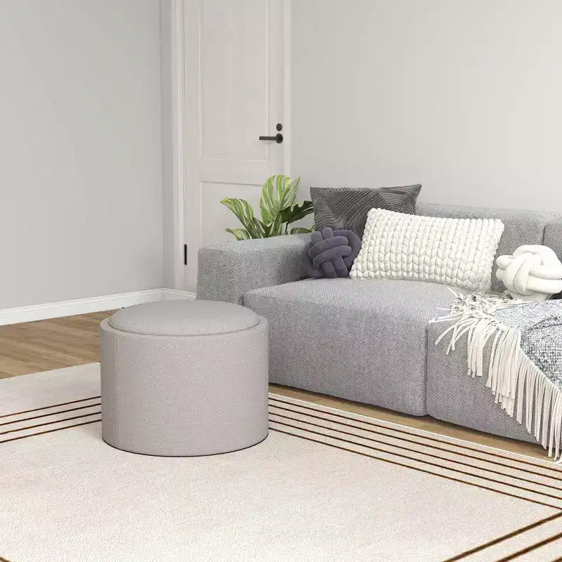 Table basse de rangement HOMCOM avec plateau rabattable et espace caché, repose-pieds rond avec revêtement en tissu aspect lin
