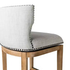 Tabouret de bar à dossier ailé en tissu Hugo Maven Lane