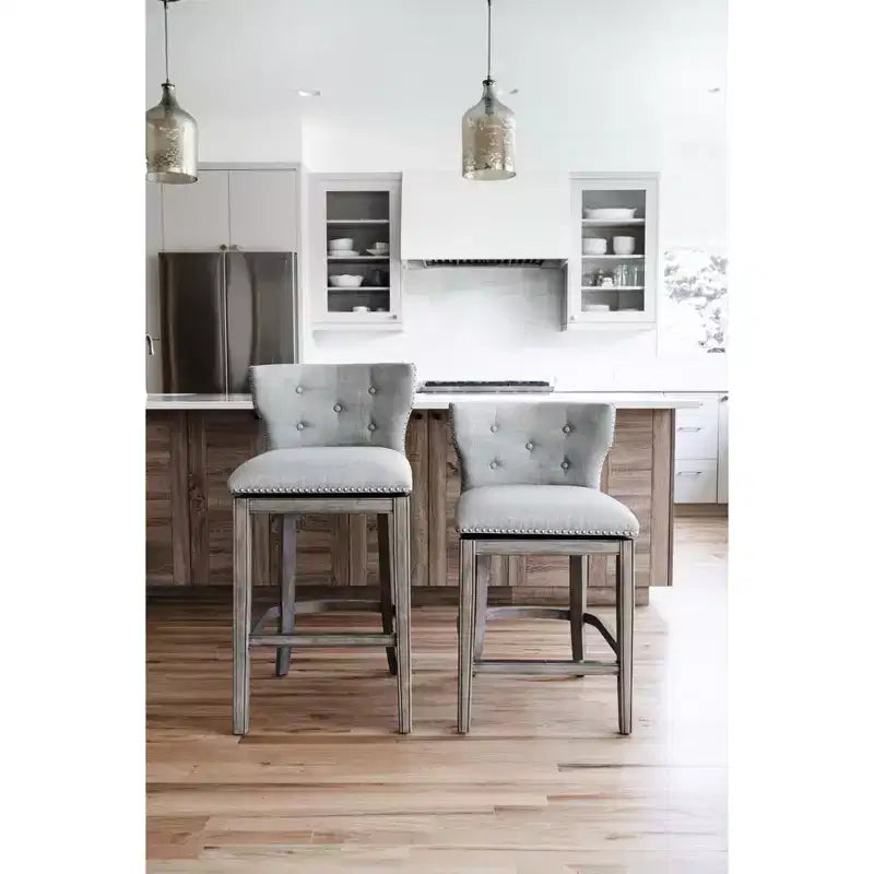 Tabouret de bar à dossier ailé en tissu Hugo Maven Lane