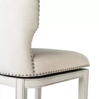 Tabouret de bar à dossier ailé en tissu Hugo Maven Lane