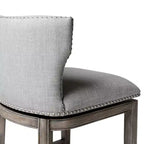 Tabouret de bar à dossier ailé en tissu Hugo Maven Lane