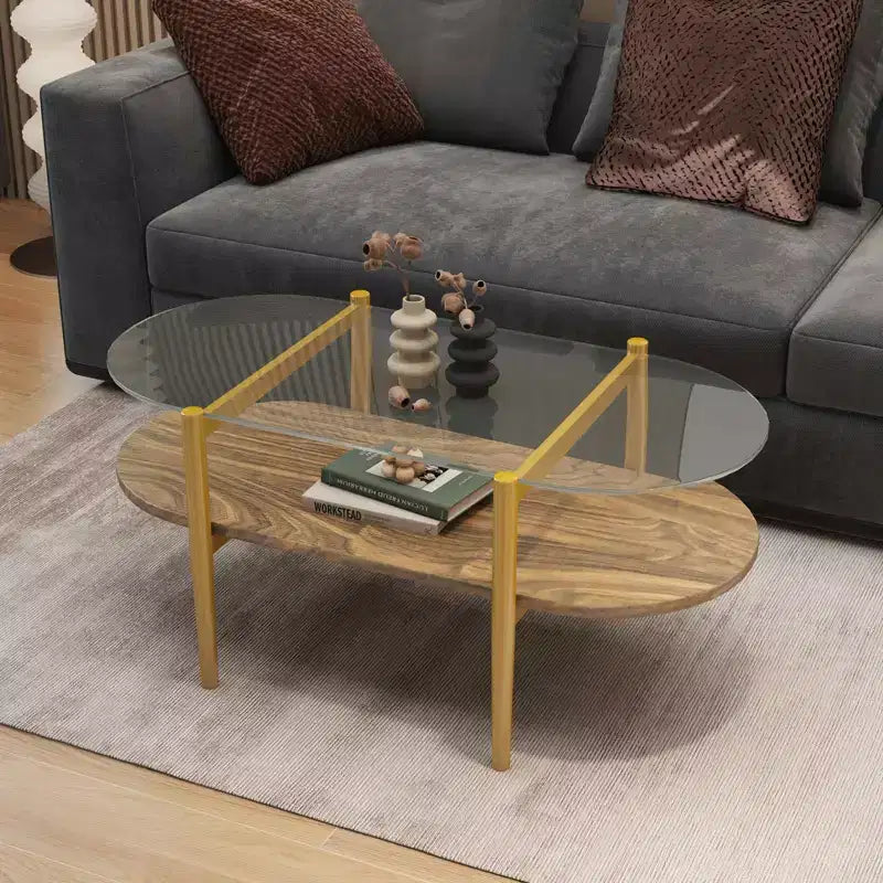 Table Basse Ovale en Verre MAYEERTY, Structure à 2 Niveaux Plateau en Verre Transparent et Étagère en Bois Noyer, Pieds Coniques avec Cadre Doré