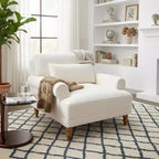 Fauteuil d'appoint Polibi surdimensionné avec accoudoirs circulaires et coussin lombaire