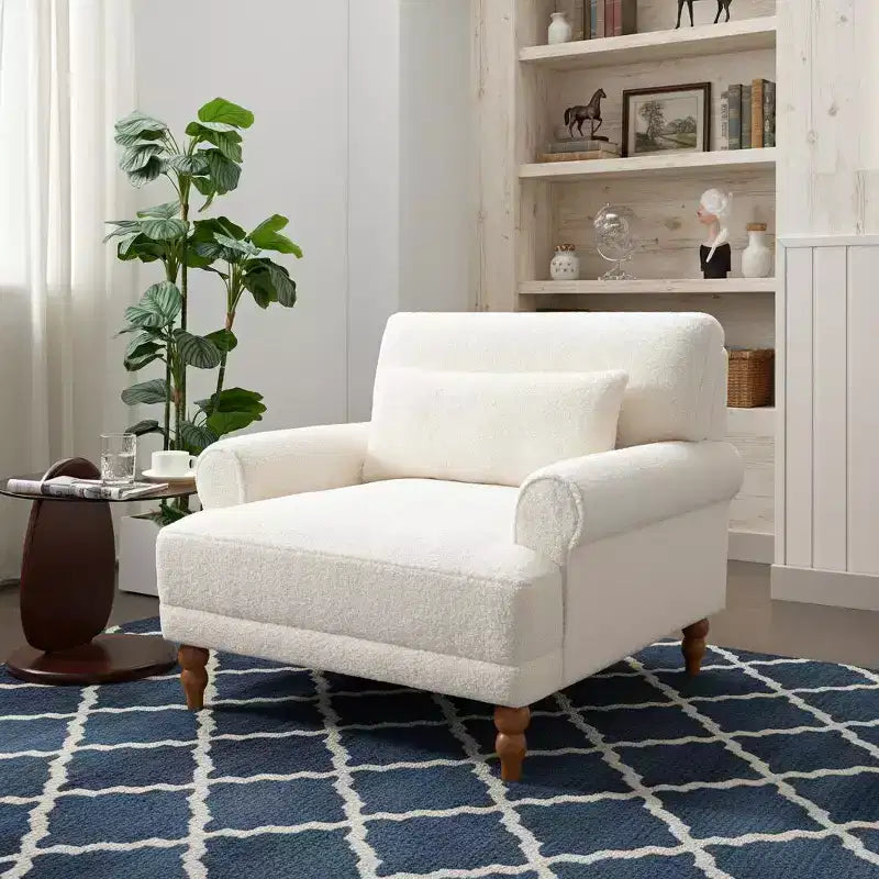Fauteuil d'appoint Polibi surdimensionné avec accoudoirs circulaires et coussin lombaire