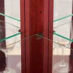Meuble d'angle vitré avec éclairage, étagères en verre réglables et décoration perlée pour l'affichage de collections