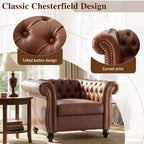 Fauteuil club Chesterfield Zeus et Ruta avec accoudoirs volutes, garniture cloutée et pieds en bois massif