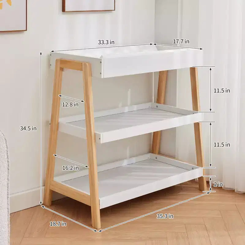 Table à langer portable moderne compacte avec matelas imperméable et 2 étagères de rangement pour nouveau-nés et nourrissons.