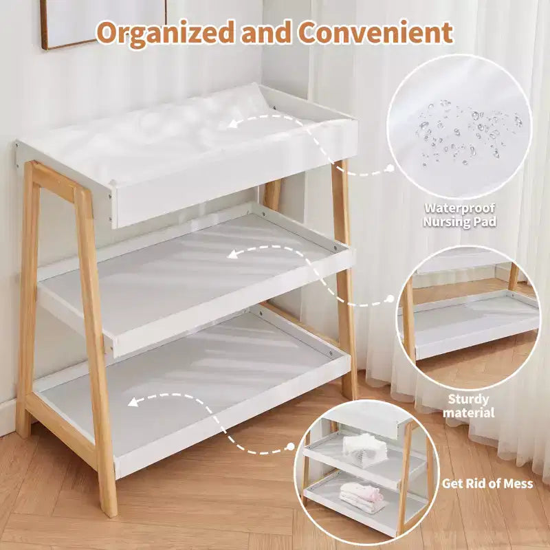 Table à langer portable moderne compacte avec matelas imperméable et 2 étagères de rangement pour nouveau-nés et nourrissons.