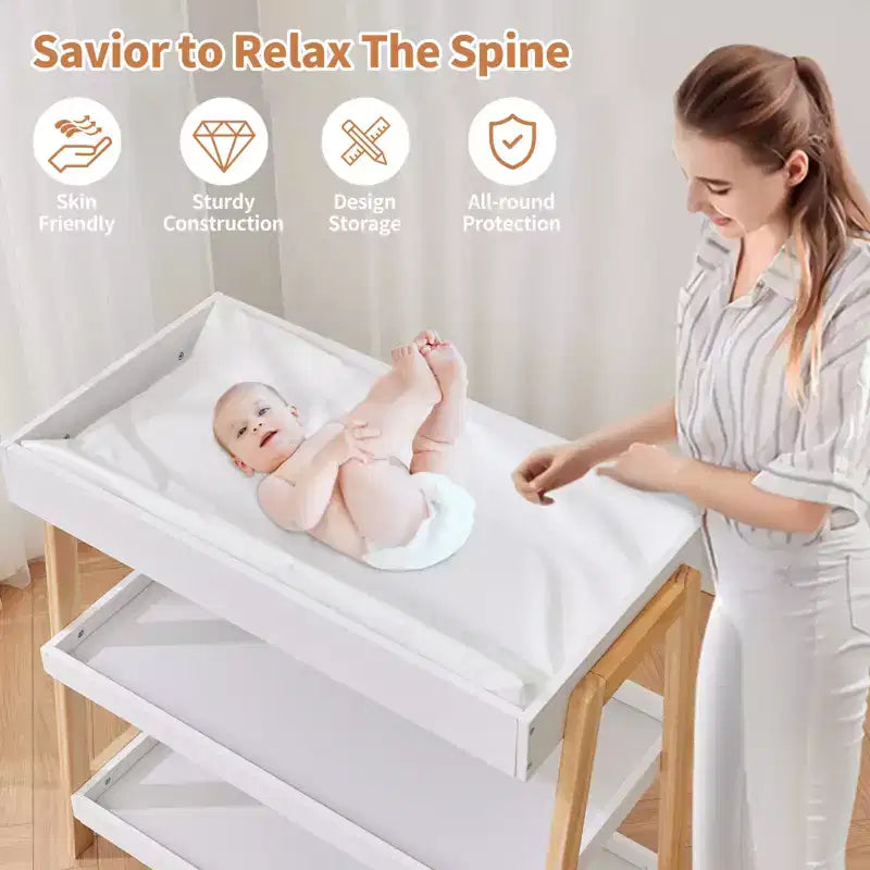 Table à langer portable moderne compacte avec matelas imperméable et 2 étagères de rangement pour nouveau-nés et nourrissons.
