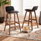 Baxton Studio Lot de 2 tabourets de bar Darrin en similicuir et bois noir/noyer/marron : siège ovale rembourré, hauteur fixe de 76 cm