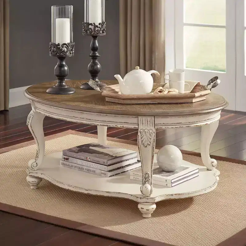 Table basse Realyn blanche/marron - Signature Design by Ashley : style cottage, finition bois vieilli, pieds incurvés