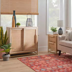 Meuble de rangement Gordon avec porte coulissante en rotin naturel, 1 étagère et base en métal doré - Powell